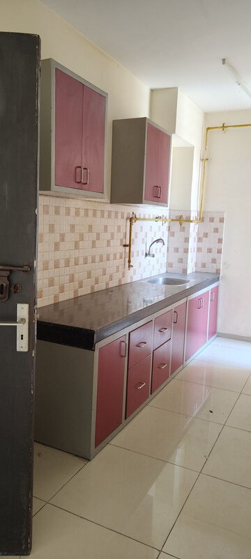 Kitchen in 2 BHK Apartment at Wave Dream Homes, Wave City – for Rent