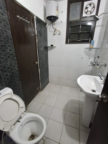 Bathroom in 3 BHK Apartment at Dhakoli – for Rent