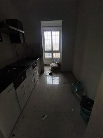 Kitchen in 2 BHK Apartment at Puranik Rumah Bali, Ghodbunder Road – for Rent