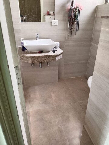 Bathroom in 2 BHK Apartment at Cosmos Express 99, Sector 99 – for Sale