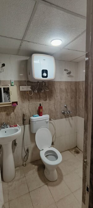 Bathroom in 2 BHK Apartment at Nilaya Greens, Raj Nagar Extension – for Sale