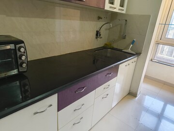 Kitchen in 1 BHK Apartment at Puranik Rumah Bali, Ghodbunder Road – for Sale