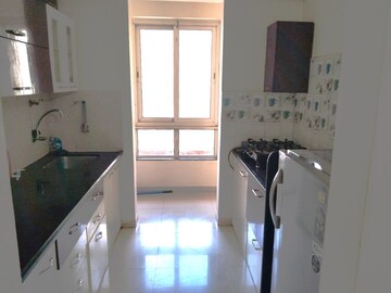 Kitchen in 1 BHK Apartment at Puranik Rumah Bali, Ghodbunder Road – for Sale