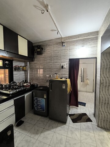 Kitchen in 1 BHK Apartment at Sarthak CHS Goregaon, Goregaon East – for Rent