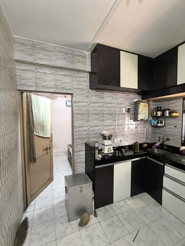 Kitchen in 1 BHK Apartment at Sarthak CHS Goregaon, Goregaon East – for Rent