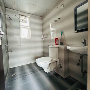 Bathroom in 3.5 BHK Apartment at Parker White Lily, Omaxe City – for Sale