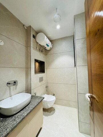 Bathroom in 4 BHK Builder Floor at Ansal API Esencia, Sector 67 – for Sale