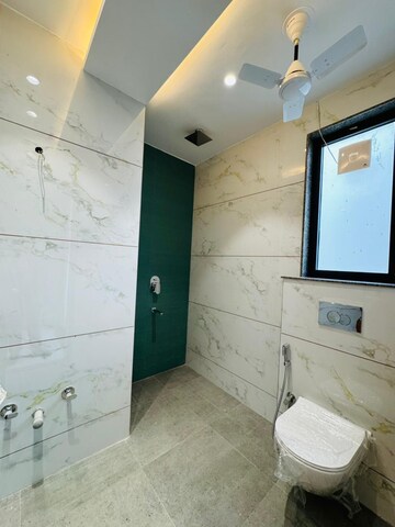 Bathroom in 4 BHK Builder Floor at Ansal API Esencia, Sector 67 – for Sale