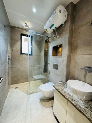 Bathroom in 4 BHK Builder Floor at Ansal API Esencia, Sector 67 – for Sale