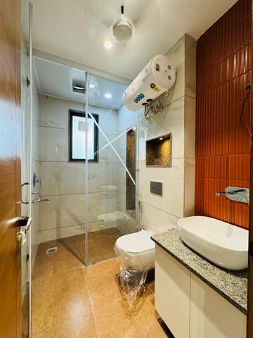 Bathroom in 4 BHK Builder Floor at Ansal API Esencia, Sector 67 – for Sale