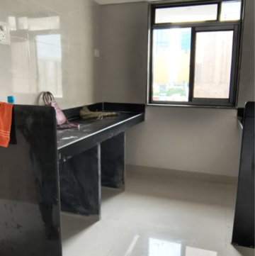 Kitchen in 1 BHK Apartment at BG Shirke Monte Verita West Tower, Trimurty Nagar – for Rent