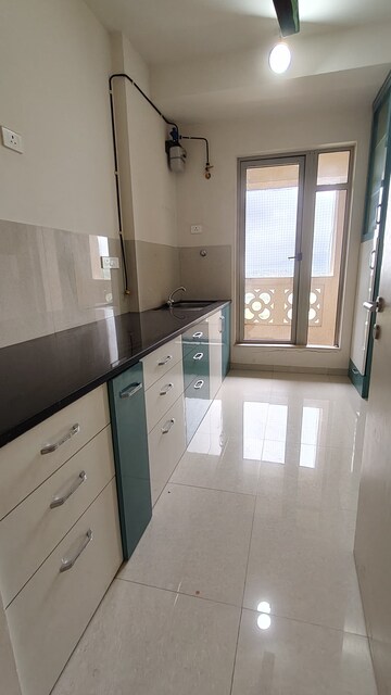 Kitchen in 2 BHK Apartment at Hiranandani Fortune City, New Panvel – for Sale