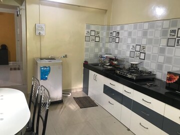 Kitchen in 3 BHK Apartment at Borate Jijai Nagari, Kothrud – for Rent