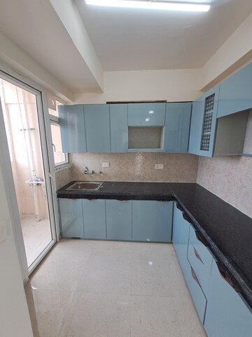 Kitchen in 2 BHK Apartment at Signature The Millennia 2, Sector 37d – for Rent
