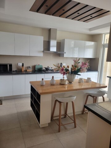 Kitchen in 4 BHK Apartment at Godrej Meridien, Sector 106 – for Sale
