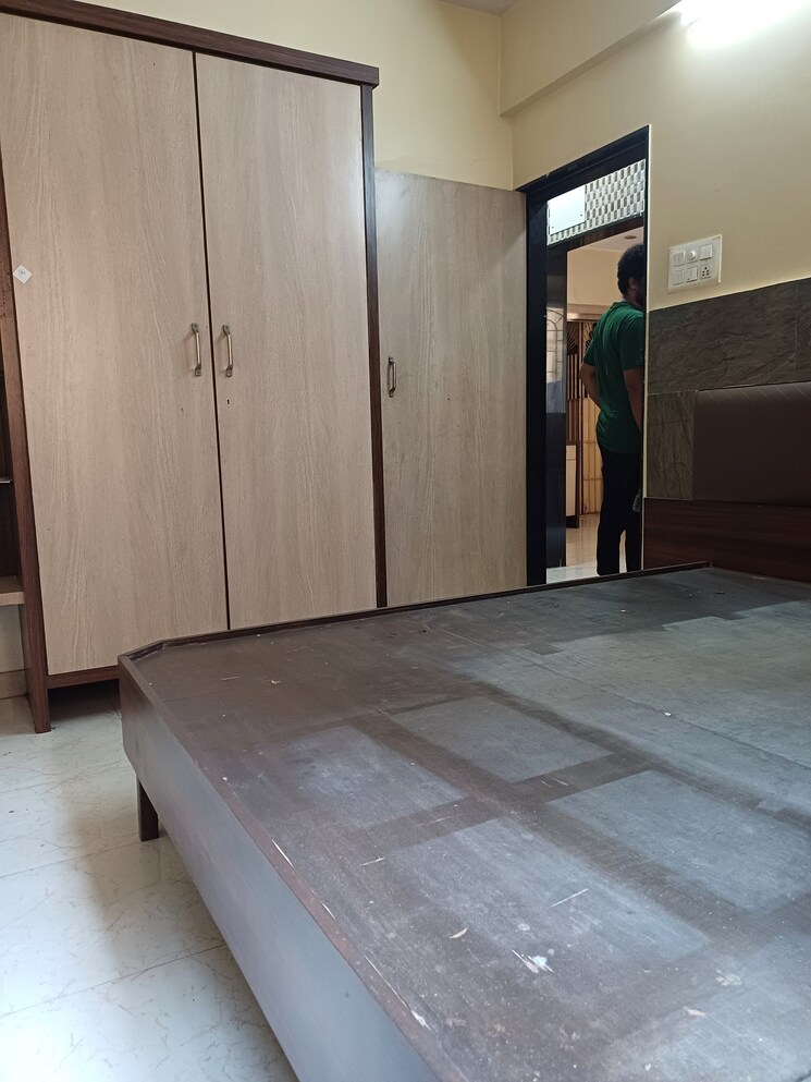 Master Bedroom, surya-kiran-chs-ghansoli 1 Bedroom 677 Sq.Ft. Apartment In Ghansoli Navi Mumbai 8848623