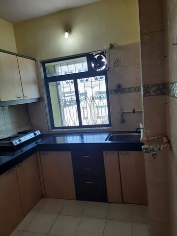 Kitchen in 2 BHK Apartment at Poonam Darshan, Andheri East – for Rent