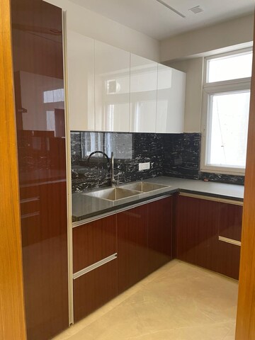 Kitchen in 3.5 BHK Penthouse at Shri Krishna Residency, Gms Road – for Sale