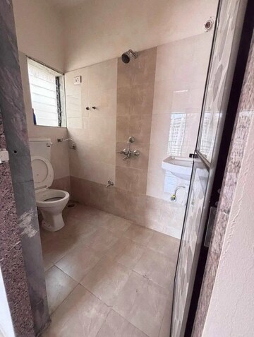 Bathroom in 2 BHK Apartment at Paradise Sai Suncity, Ghot – for Sale
