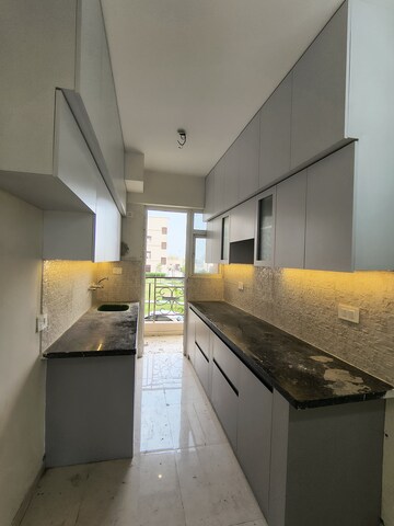 Kitchen in 2.5 BHK Apartment at Signature The Millennia 2, Sector 37d – for Rent