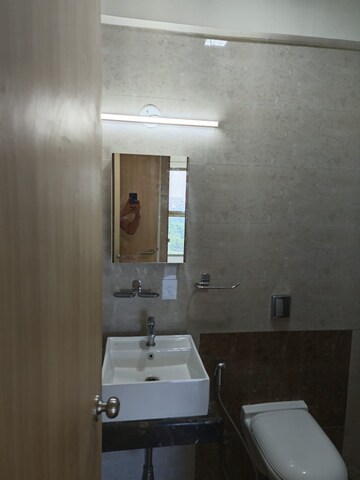Bathroom in 3 BHK Apartment at Raj Infinia, Malad West – for Rent