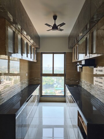 Kitchen in 3 BHK Apartment at Raj Infinia, Malad West – for Rent