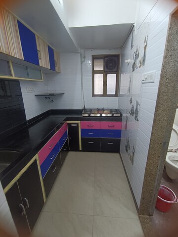 Kitchen in 1 BHK Apartment at Neel Rashmi Apartment, Malad West – for Rent