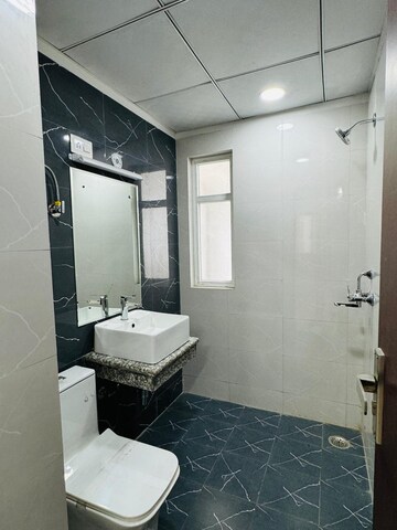Bathroom in 4 BHK Apartment at SCC Blossom, Raj Nagar Extension – for Sale
