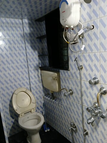Bathroom in 1 BHK Apartment at Raheja Township, Malad East – for Rent