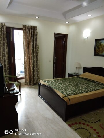 Bedroom in 2 BHK Builder Floor at Defence Colony – for Rent
