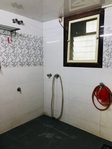 Bathroom in 2 BHK Apartment at Anant CHS Dahisar, Dahisar West – for Rent