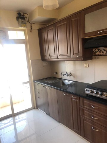 Kitchen in 3 BHK Apartment at Hiranandani Acacia, Ghodbunder Road – for Rent