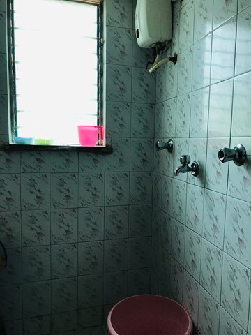 Bathroom in 1 BHK Apartment at Mandpeshwar Dham CHS, Mandapeshwar – for Sale