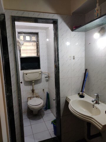 Bathroom in 1 BHK Apartment at Harshail Falcon, Malad West – for Rent