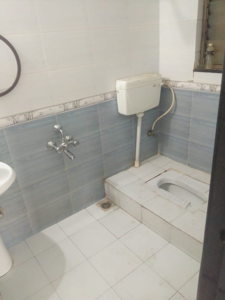 Bathroom, kolte-patil-margosa-heights 3 Bedroom 2015 Sq.Ft. Apartment In Mohammadwadi Pune 8849459