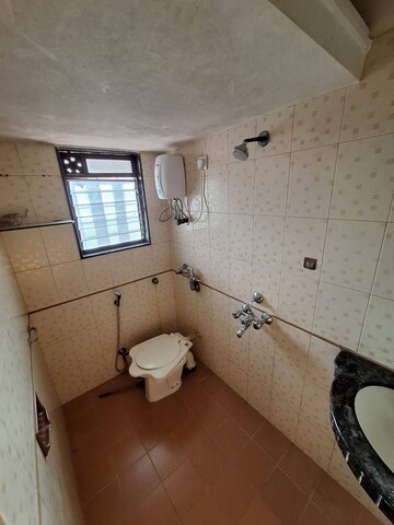 Bathroom in 2 BHK Apartment at Accord CHS Andheri West, Andheri West – for Rent