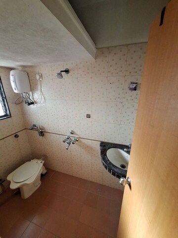 Bathroom in 2 BHK Apartment at Accord CHS Andheri West, Andheri West – for Rent