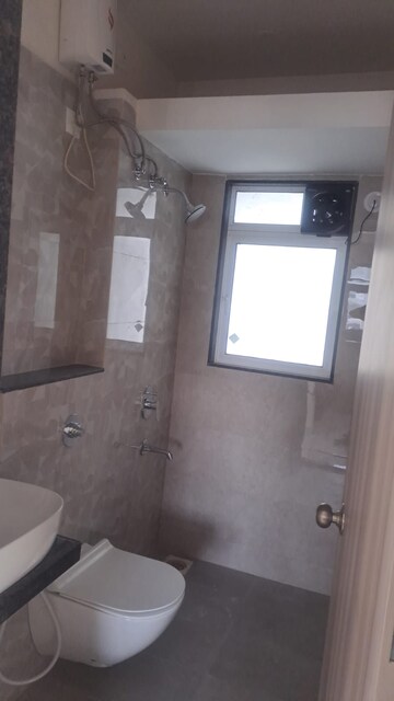 Bathroom in 2 BHK Apartment at Ashar Axis, Majiwada – for Rent