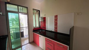Kitchen in 1 BHK Apartment at Bhumika Shelter CHS, Dombivli East – for Sale