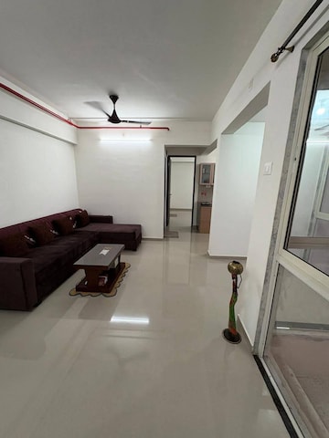 Living Room in 1 BHK Apartment at Puraniks Tokyo Bay Phase 2, Kasarvadavali – for Rent