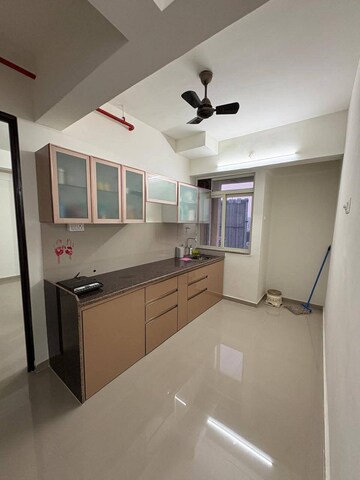 Kitchen in 1 BHK Apartment at Puraniks Tokyo Bay Phase 2, Kasarvadavali – for Rent