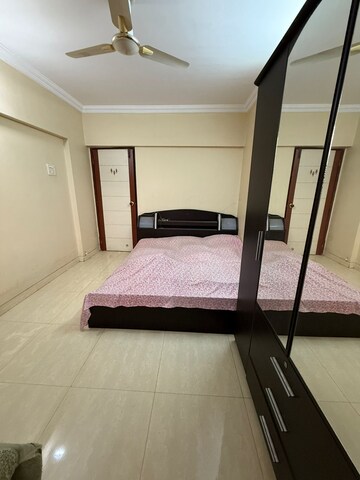 Bedroom in 3 BHK Apartment at Green Valley CHS, Wanwadi – for Rent