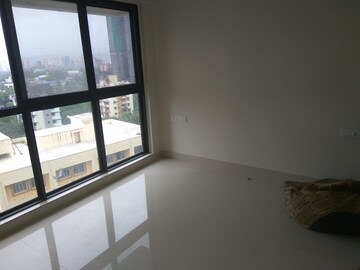Bedroom in 2 BHK Apartment at Rustomjee Meridian, Kandivali West – for Rent
