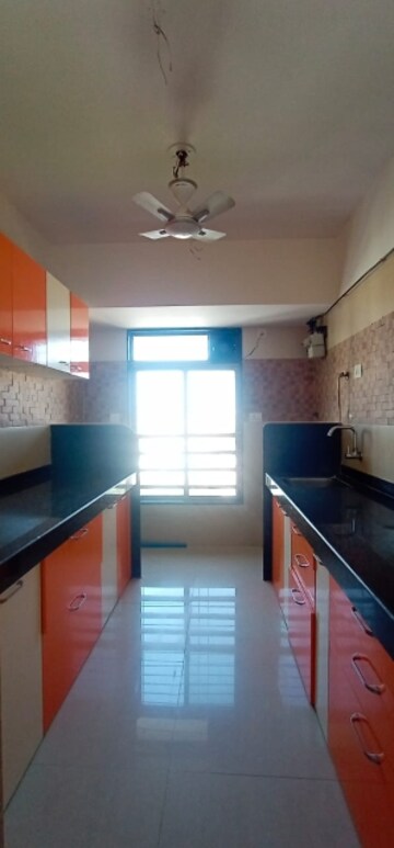 Kitchen in 1 BHK Apartment at Romell Shraddha, Borivali West – for Rent