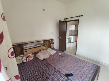 Bedroom in 2 BHK Builder Floor at Guru Nanak Enclave, Dhakoli – for Rent