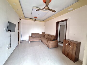 Living Room in 1 BHK Apartment at Lodha Palava City, Dombivli East – for Rent