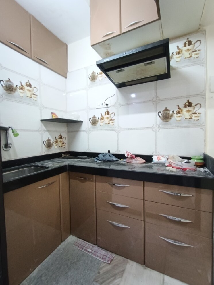 Kitchen, blue-shelter 1 Bedroom 420 Sq.Ft. Apartment In Dahisar West Mumbai 8849853