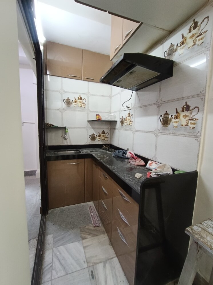 Kitchen, blue-shelter 1 Bedroom 420 Sq.Ft. Apartment In Dahisar West Mumbai 8849853
