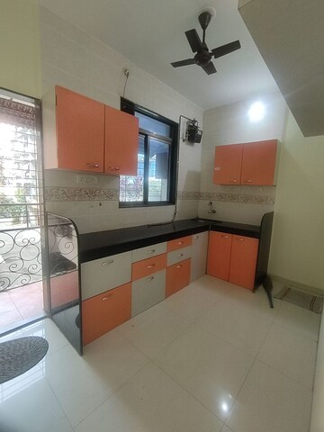 Kitchen in 2 BHK Apartment at  Sharada Ganesh CHS, Nerul – for Rent