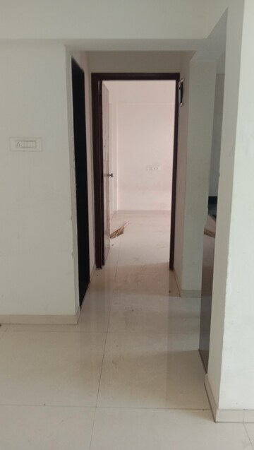 Building Lobby in 1 BHK Apartment at Uma Elements, Daighar Gaon – for Rent